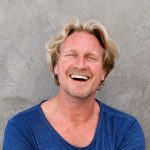 handsome-caucasian-man-smiling-with-arms-crossed-a-WEUV9NT.jpg